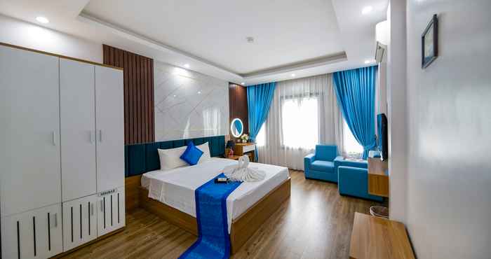 Kamar Tidur Aquarius Grand Hotel