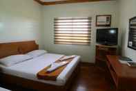 Bedroom RedDoorz Premium @ Nick Hotel Gerona Tarlac