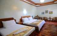 Bedroom 4 RedDoorz Premium @ Nick Hotel Gerona Tarlac