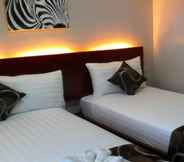 Kamar Tidur 6 Rovic's Tourist Hotel