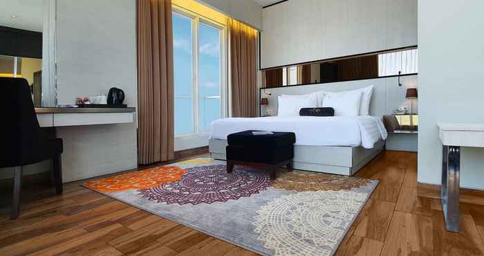 Kamar Tidur Palmy Exclusive Hotel