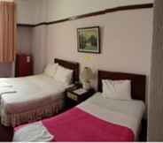 Kamar Tidur 4 Daeng Plaza Hotel 