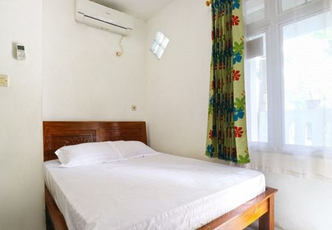 Kamar Tidur OYO 3408 Merica Place Syariah Near Rumah Sakit Bhineka Bakti Husada