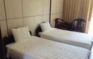 Phòng ngủ 4 Huong Tra Hotel