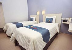 寝室 2 Graha Cempaka Boutique Hotel