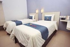 寝室 Graha Cempaka Boutique Hotel