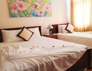 Kamar Tidur 2 Holiday Diamond Hotel