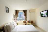 Kamar Tidur Thanh Long Tan Hotel