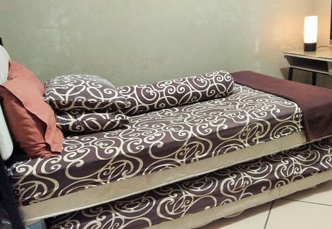 Bedroom Bening Guesthouse Near UGM
