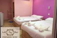 ห้องนอน Baan Suratwadee Resort 