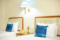 ห้องนอน Wiang Indra Riverside Resort
