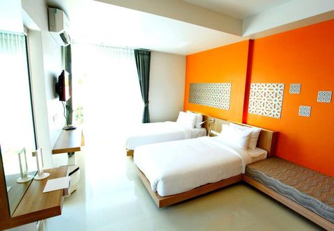 ห้องนอน Tonkok Hotel