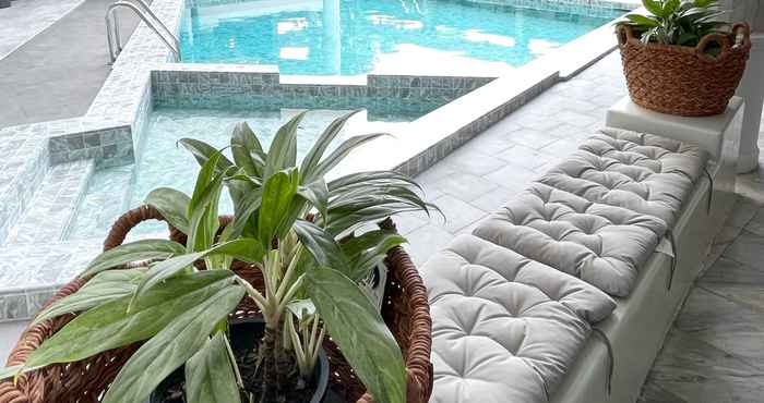 Swimming Pool Garden Paradise Hotel & Serviced Apartment