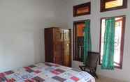 Bedroom 3 Affordable Room at Kubu Darling Legian