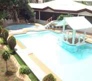 Swimming Pool 4 OYO 725 Richdel Resort Hotel