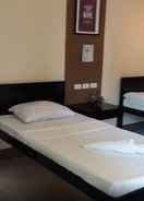 BEDROOM OYO 725 Richdel Resort Hotel