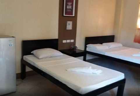 Bedroom OYO 725 Richdel Resort Hotel