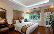 Kamar Tidur 4 Lam Bao Long Hotel