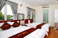 Kamar Tidur Blue Clouds Homestay