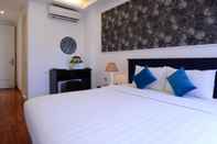 Kamar Tidur Golden Sun Hotel