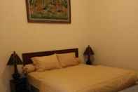 ห้องนอน Cozy Room at Warung Limasan Homestay