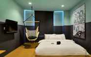 Kamar Tidur 5 The Hammock Hotel Fine Arts Museum