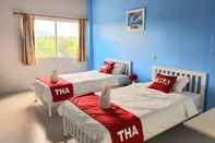 ห้องนอน Thanagrit Apartelle