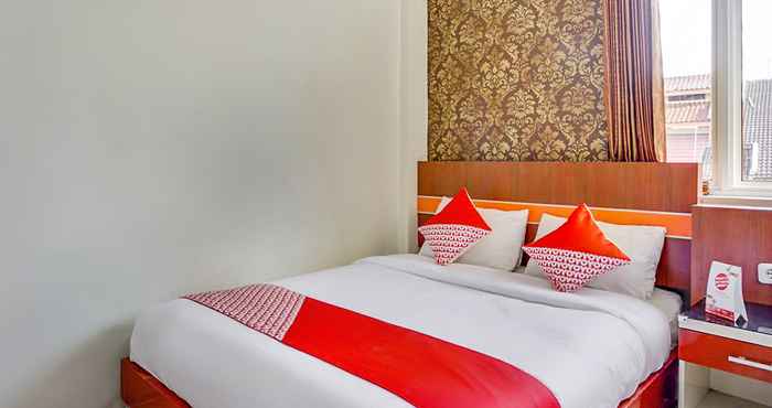 Bilik Tidur OYO 3157 Grand City Inn