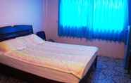 Kamar Tidur 4 Nong Guest House