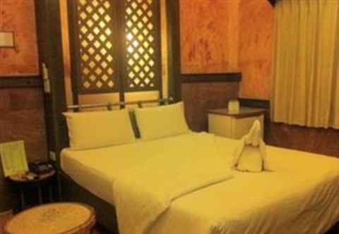 Kamar Tidur Palm Chalet Resort