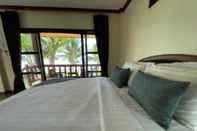 ห้องนอน Phi Phi Villa Resort (SHA Extra Plus)