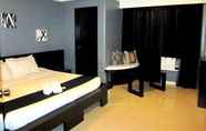 Kamar Tidur 4 Richmond Plaza Hotel