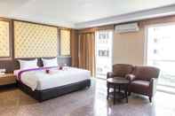 ห้องนอน M Village Hostel (SHA Extra Plus)