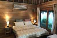 ห้องนอน Thap Pala Cottage