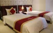 Kamar Tidur 7 White Snow Hotel