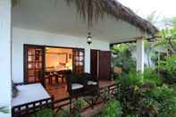 Kamar Tidur Cham Villas Boutique Luxury Resort