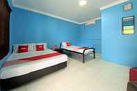 Phòng ngủ Capital O 90168 Serambi Pelangi Chalet
