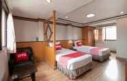 Kamar Tidur 7 Super OYO 75385 Hotel Win Long