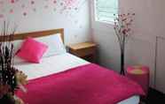 Bedroom 2 Pink Guest House