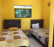 Bedroom 6 Low-budget Room near Train Station Paledang at Wisma Firman (WF3)