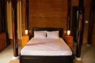 Kamar Tidur The Grass Vy Homestay