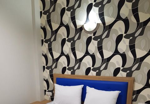 Kamar Tidur Ethan Hotel Kelapa Gading