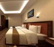 Kamar Tidur 6 Grand Asrilia Hotel Convention & Restaurant