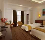 Kamar Tidur 7 Grand Asrilia Hotel Convention & Restaurant