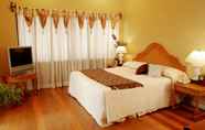 Kamar Tidur 6 Sophia Suites Residence Hotel