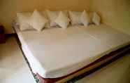 ห้องนอน 6 Lawiswis Kawayan Resort