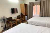 Kamar Tidur Dragon Airport Hotel