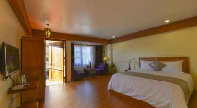 Kamar Tidur 4 The Mountaineer Hotel