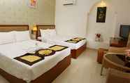 Kamar Tidur 3 Nhi Nhi Hotel