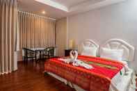 Bilik Tidur Triple Rund Place Hotel